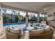 Outdoor oasis with a pool, spa, and covered patio at 14608 Derna Ter, Bradenton, FL 34211