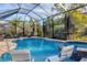 Relax by the pool and spa in this screened enclosure at 14608 Derna Ter, Bradenton, FL 34211