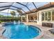 Enjoy this luxurious pool and spa area with plenty of seating at 14608 Derna Ter, Bradenton, FL 34211