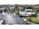 Community pool, spa, tennis courts, and pond at 15207 Shaker Ct # 15207, Tampa, FL 33618