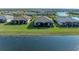 Aerial view of homes backing onto a picturesque lake at 15917 Clear Skies Pl, Lakewood Ranch, FL 34211