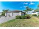 Charming single-story home featuring a two-car garage, tile roof, and well-maintained landscaping at 15917 Clear Skies Pl, Lakewood Ranch, FL 34211