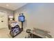 Arcade games on display, with vibrant graphics and easy access to the door in this fun game room at 15917 Clear Skies Pl, Lakewood Ranch, FL 34211