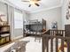 bedroom with bunk beds and crib at 17459 Hickok Belt Loop, Bradenton, FL 34211