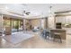Bright Gathering room featuring an open floor plan and access to a lanai at 17459 Hickok Belt Loop, Bradenton, FL 34211