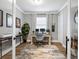 Home office with built-in desk and plenty of natural light at 17459 Hickok Belt Loop, Bradenton, FL 34211