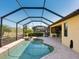 Inviting pool and spa with screened enclosure and paver patio at 17459 Hickok Belt Loop, Bradenton, FL 34211
