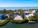 Waterfront property with vacant lot and ocean views at 18 N Casey Key Rd, Osprey, FL 34229