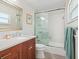 Clean bathroom with a walk-in shower and updated vanity at 18 N Casey Key Rd, Osprey, FL 34229