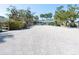 Long gravel driveway leads to the home, offering ample parking space at 18 N Casey Key Rd, Osprey, FL 34229