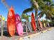 Brightly colored kayaks are available for rent near palm trees at 18 N Casey Key Rd, Osprey, FL 34229
