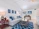 Relaxing living room with comfortable seating and coastal decor at 18 N Casey Key Rd, Osprey, FL 34229