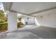 Covered carport provides parking for one vehicle at 1815 Vera Pl # 9, Sarasota, FL 34235