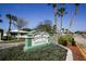 Strathmore Condominiums entrance sign with lush landscaping at 1815 Vera Pl # 9, Sarasota, FL 34235