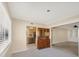 Dining room with built-in hutch and view into kitchen at 1815 Vera Pl # 9, Sarasota, FL 34235