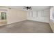 Bright living room features built-in shelving and a ceiling fan at 1815 Vera Pl # 9, Sarasota, FL 34235
