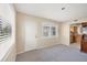 Living room with gray carpet and access to exterior at 1815 Vera Pl # 9, Sarasota, FL 34235