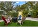 Backyard with fire pit and seating at 2202 Hyde Park St, Sarasota, FL 34239