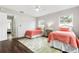 Bedroom with twin beds and shared bathroom at 2202 Hyde Park St, Sarasota, FL 34239
