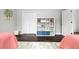 Bedroom with twin beds, closet, and built-in shelving at 2202 Hyde Park St, Sarasota, FL 34239