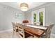 Dining room with wooden table and access to backyard at 2202 Hyde Park St, Sarasota, FL 34239