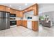 Kitchen with stainless steel appliances and breakfast bar at 2202 Hyde Park St, Sarasota, FL 34239