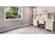 Home office with built-in desk and window at 2202 Hyde Park St, Sarasota, FL 34239