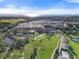 Wide aerial view of the community and surrounding areas at 26720 Weiskopf Dr, Englewood, FL 34223