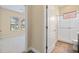 Bathroom with shower and tile floors at 26720 Weiskopf Dr, Englewood, FL 34223