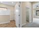 Bathroom with double vanity, walk-in shower, and tile flooring at 26720 Weiskopf Dr, Englewood, FL 34223