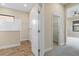 Bathroom with walk-in closet and tiled flooring at 26720 Weiskopf Dr, Englewood, FL 34223