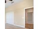 Spacious bedroom with double door closet and neutral wall paint at 26720 Weiskopf Dr, Englewood, FL 34223