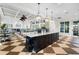 Large kitchen island with granite countertop at 26720 Weiskopf Dr, Englewood, FL 34223