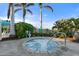 Relaxing hot tub with surrounding patio at 26720 Weiskopf Dr, Englewood, FL 34223
