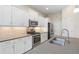 Well-equipped kitchen featuring stainless steel appliances and ample cabinetry at 26720 Weiskopf Dr, Englewood, FL 34223