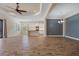 Open kitchen with island and stainless steel appliances at 26720 Weiskopf Dr, Englewood, FL 34223