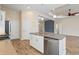 Modern kitchen with stainless steel appliances and an island at 26720 Weiskopf Dr, Englewood, FL 34223