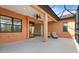 Spacious covered patio with lounge chairs and access to the interior at 26720 Weiskopf Dr, Englewood, FL 34223