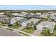 Aerial view of a luxury community showcasing upscale homes and landscaping at 3314 Chestertown Loop, Bradenton, FL 34211