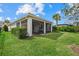 House exterior showcasing a large backyard and screened patio at 3314 Chestertown Loop, Bradenton, FL 34211