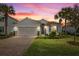 Beautiful one-story home with a two-car garage and a nicely landscaped lawn at 3314 Chestertown Loop, Bradenton, FL 34211