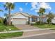 Stunning curb appeal! Two story home with a two car garage, and nicely landscaped lawn at 3314 Chestertown Loop, Bradenton, FL 34211