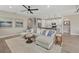 Large living room with sectional sofa and open kitchen at 3314 Chestertown Loop, Bradenton, FL 34211