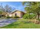 Charming one-story home featuring a well-maintained lawn and cozy front porch at 3443 Tallywood Cir # 7061, Sarasota, FL 34237