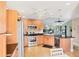 Open kitchen boasts stainless steel appliances and an island at 3443 Tallywood Cir # 7061, Sarasota, FL 34237