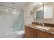 Clean bathroom with granite countertop vanity and a walk-in shower at 3455 Byron Ln, Longboat Key, FL 34228