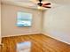 Bedroom with laminate flooring and ceiling fan at 4127 3Rd Ave W, Palmetto, FL 34221