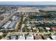 Aerial view of neighborhood with canal and houses at 4419 Mangrove Point Rd, Bradenton, FL 34210