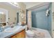 Clean bathroom with shower/tub combo and tile surround at 4419 Mangrove Point Rd, Bradenton, FL 34210