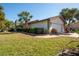House exterior showcasing garage and landscaping at 4419 Mangrove Point Rd, Bradenton, FL 34210